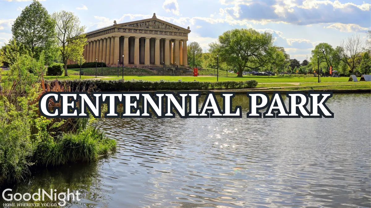 A tranquil exterior view featuring the Parthenon-like structure, a calm lake with reflections, and lush park greenery. The scene is peaceful and inviting, ideal for recreation or a family picnic.
